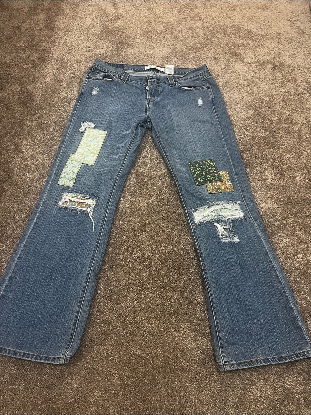 VINTAGE Levi's Blue Patchwork Bootcut Jeans with Floral Accents